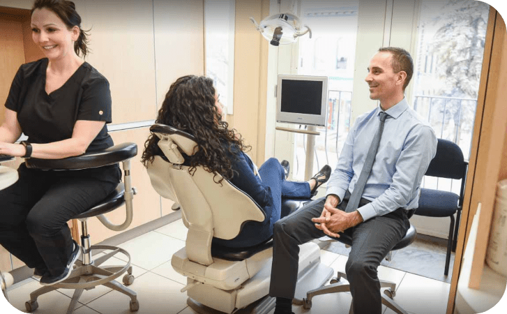 Dr. Wes Arbuckle with Patient | Absolute Dentistry | Family & General Dentist | Okotoks Dentist